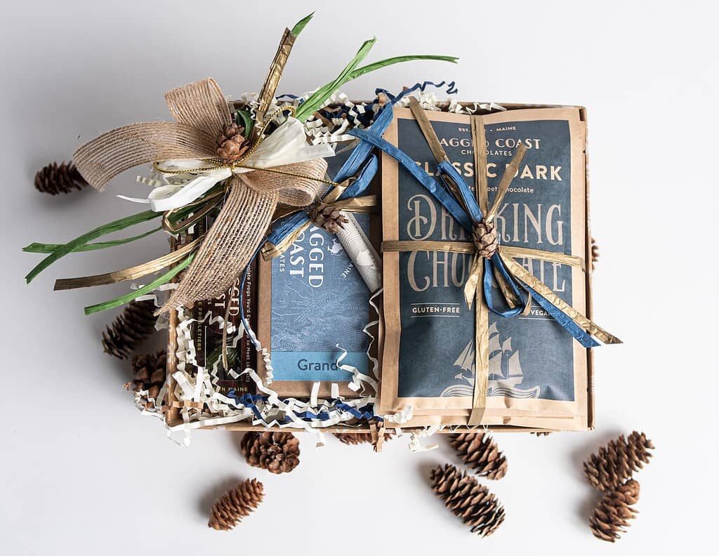 chocolate gift wrapped for christmas with twine and pinecones