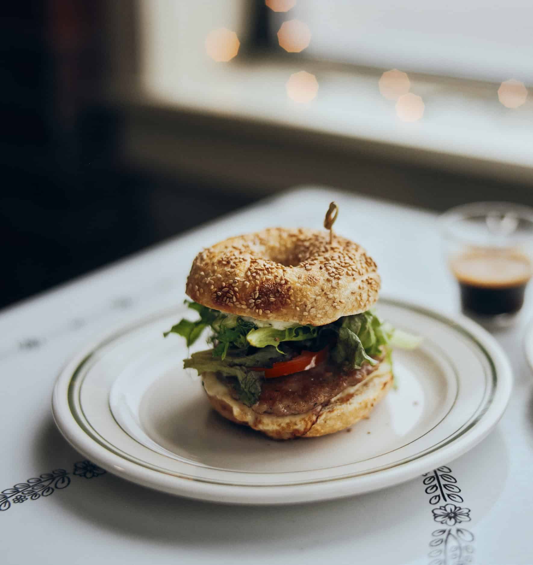 bagel breakfast sandwich on a plate at Forage Market